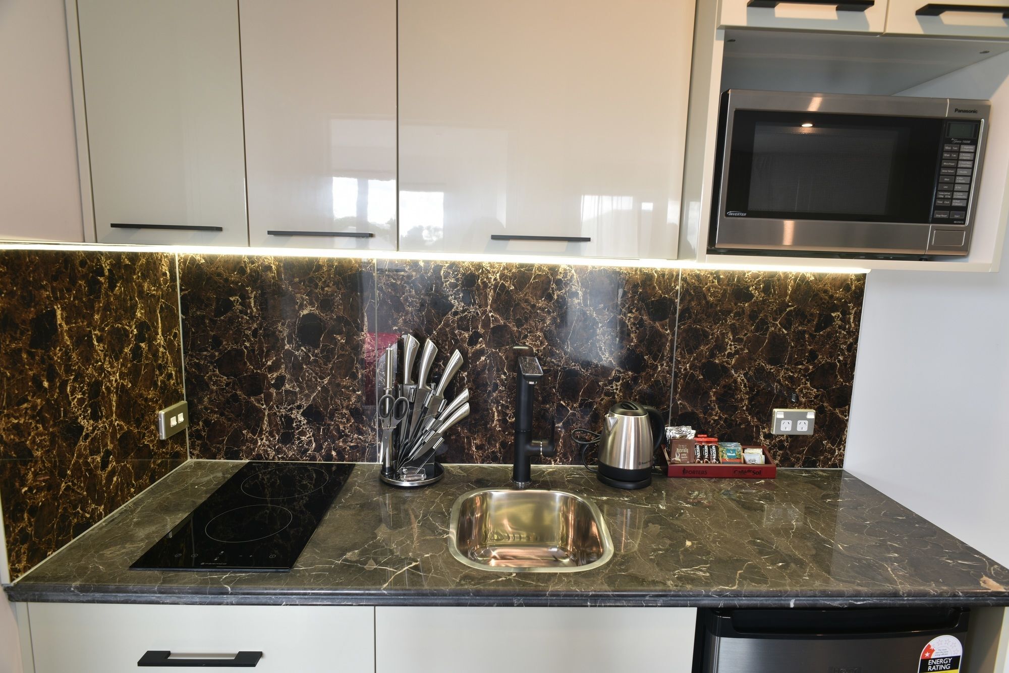 Bealey Plaza Motel Christchurch Luaran gambar A kitchen in a serviced apartment